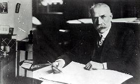 Sir Edward Elgar (1857-1934) at work on one of his orchestral scores