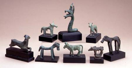 Collection of Greek bronze animals including a boara griffin and a running deer von Anonymous