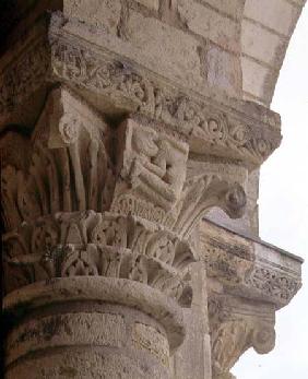 Column capital with stylised foliage designs around the figure of an acrobatfrom the porch exterior 13th centu