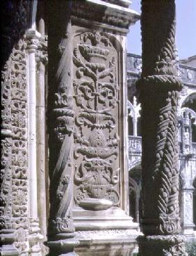 Detail of a column and a high relief in the North Gallery of the Cloister of the Monastery 16th centu