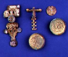 Selection of Anglo-Saxon jewellery; gilded bronze brooch; gilded bronze crossbow fibula; gilded copp 4th-6th ce