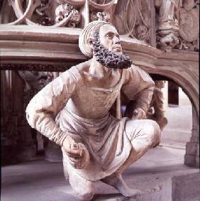 Self portrait of Adam Krafft (1460-1508) sculpture at the base of the ciborium