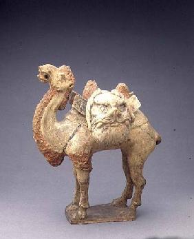 Tomb figure of a camel, carrying saddle bags in the form of grotesque faces, Chinese,Tang Dynasty 7th-8th ce