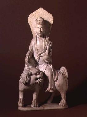 Figure of the Bodhisattva Guanyin, holding a vase with a willow twig and sitting on a Buddhist lion, 18th centu