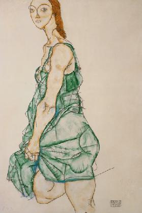 Stehende Frau in grünem Hemd 1914