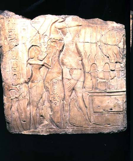 Relief fragment depicting Akhenaten followed by Nefertiti and Meritaten before an offering table, Ne von Egyptian