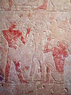 Relief depicting two sculptors carving a statue, from the mastaba of Kaemrehu, Saqqara, Old Kingdom c.2325 BC