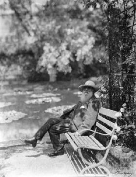 Claude Monet (1841-1926) in his garden at Giverny, c.1920 (b/w photo) 19th