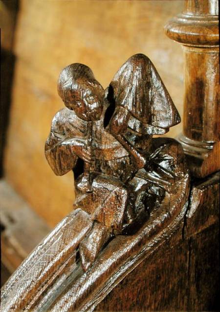 Musician playing a double flute, detail from a choir stall von French School