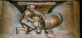 Carving depicting a man putting a tap on a barrel, from a choir stall from the Abbey of St. Lucien i