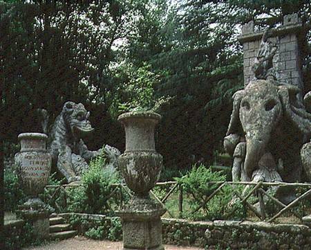 One of Hannibal's elephants and a dragon fighting with a lion, sculptures from the Parco dei Mostri von Giacomo Barozzi da Vignola