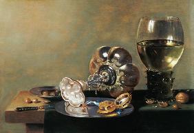 A still life with glass of wine, tazza and a pewter plate 17th