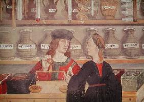 Interior of a Pharmacy, detail of the shopkeeper weighing produce