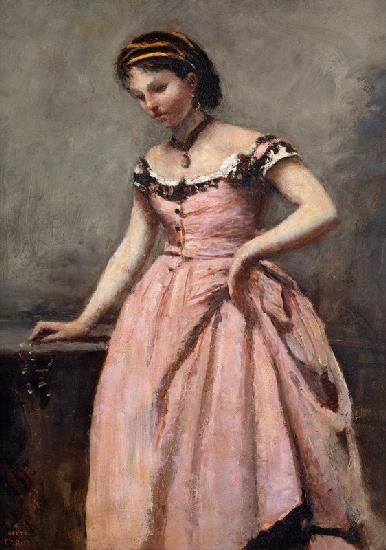Young woman in pink dress