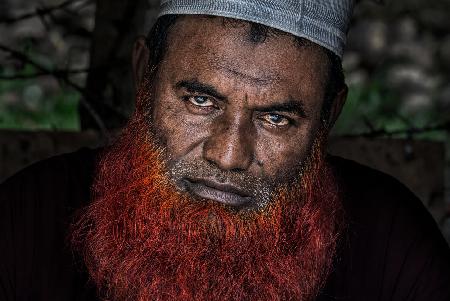 Mann mit rotem Bart aus Papua-Neuguinea