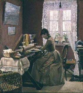 Johanne Wilde, the artist's wife, at her loom