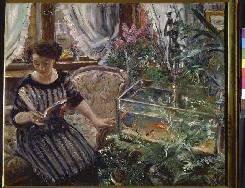 Lesende Frau am Goldfischbassin von Lovis Corinth