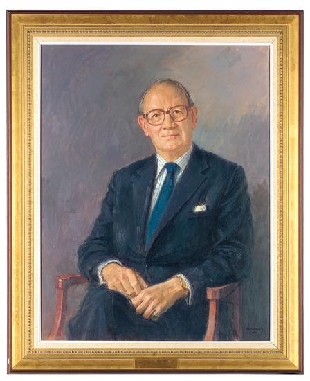 Portrait of Lord Aldington, seated wearing a dark suit 1984