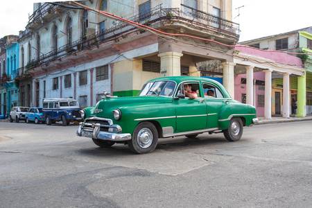 Green Oldtimer in Havana, Cuba. Street in Havanna, Kuba. 2020