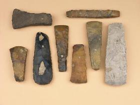 Collection of Neolithic to early Bronze Age weapon heads including Scandinavian stone battle and Dan
