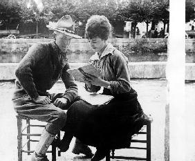 American soldier learning French with a French woman 1917-1918