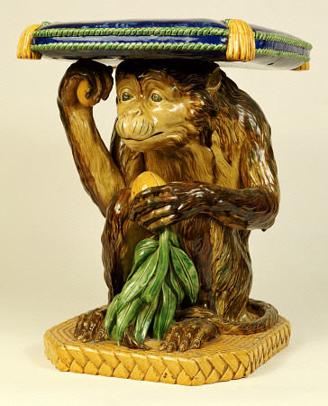 A Minton ''Majolica'' Garden Seat Modelled As A Crouching Monkey Supporting A Cushion On His Head, C von 