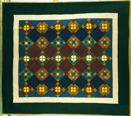 An Amish Pieced & Quilted Cotton Coverlet Worked In A Variation On The Nine Patch Pattern, von 
