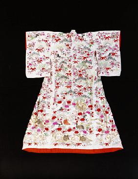 A Furisode Of White Silk Damask Stencilled With Bamboo Leaves And Plum Blossom