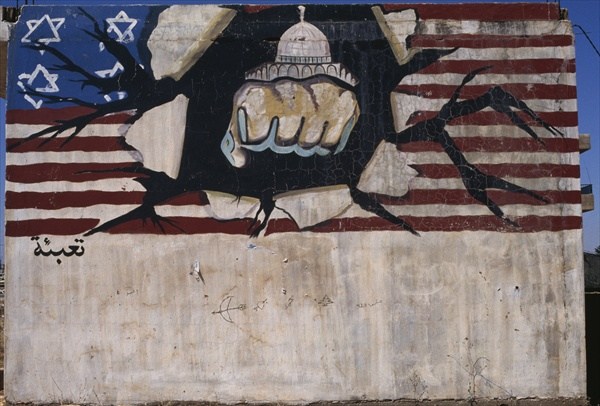 Mural depicting the Hezbollah punching the American flag (colour photo)  von 