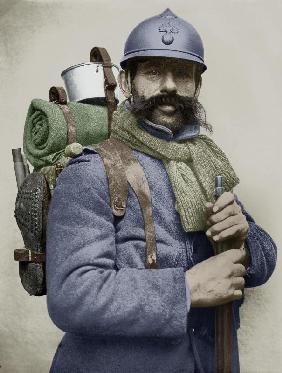 Portrait of a French soldier dressed with his sky blue military uniform and carrying a backpack, wit