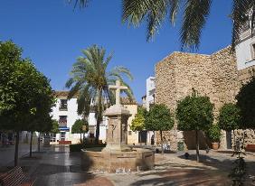 Plaza de Santa Maria de la Encarnacion and section of old city walls, Marbella, Malaga, Costa del So