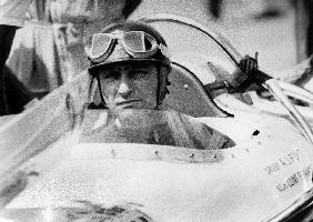 racing driver Fangio here at the wheel during race in Monza June 28, 1
