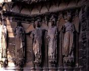 St. Nicaise flanked by two angels, sculptures on the exterior West Facade, 14th century originals (s 19th