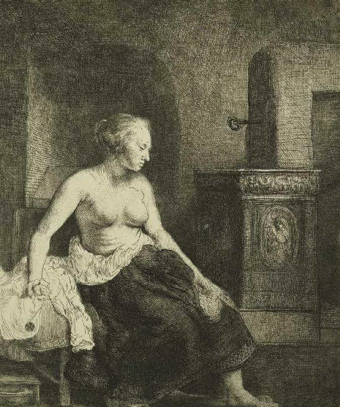 Sitzende Frau an einem Ofen von Rembrandt van Rijn