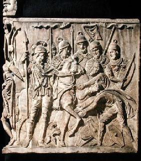 Relief from a sarcophagus depicting the submission of a barbarian to a Roman troop