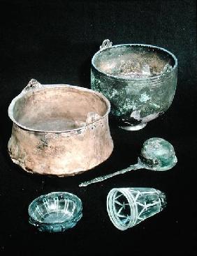 Selection of funerary goods including two cauldrons, from Sweden
